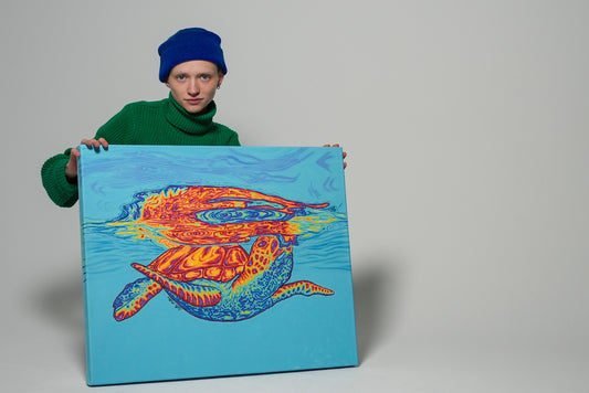 Artist Bubbacutie Holding Large Chromatic Turtle painting